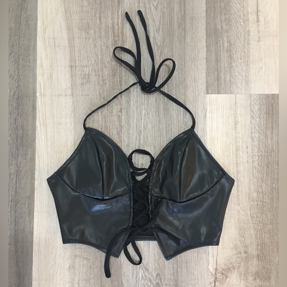 Black faux leather lace up halter crop top.